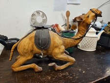 Vintage Aged Leather Camel Sculpture on Hand Carved Wood from Libertys