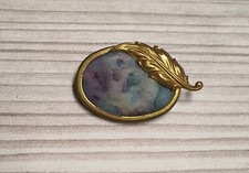 Spilla antica ovale color oro seta gioielli tradizionali design retrò vintage