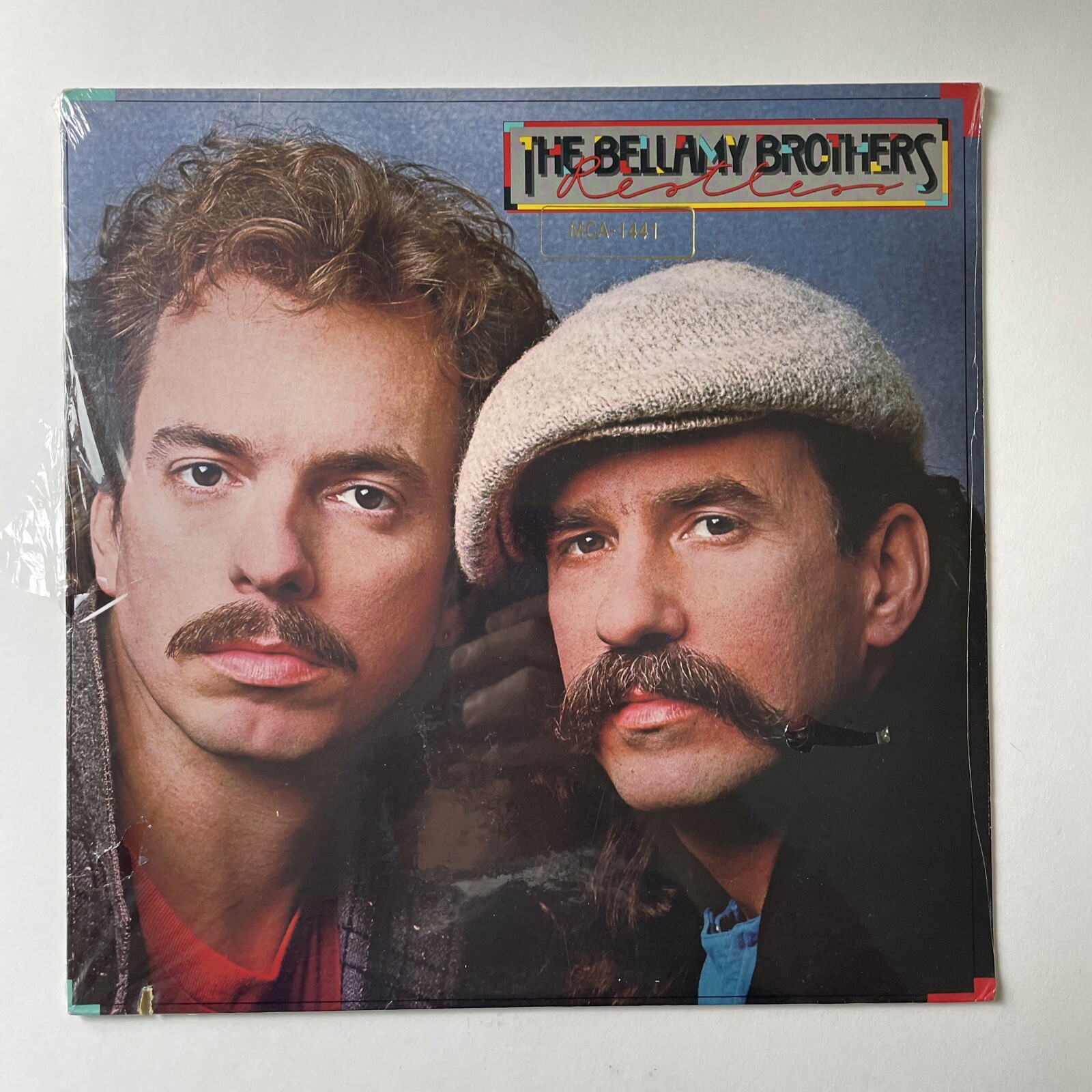 The BELLAMY BROTHERS - Restless - MCA 1441 - SEALED sorta LP