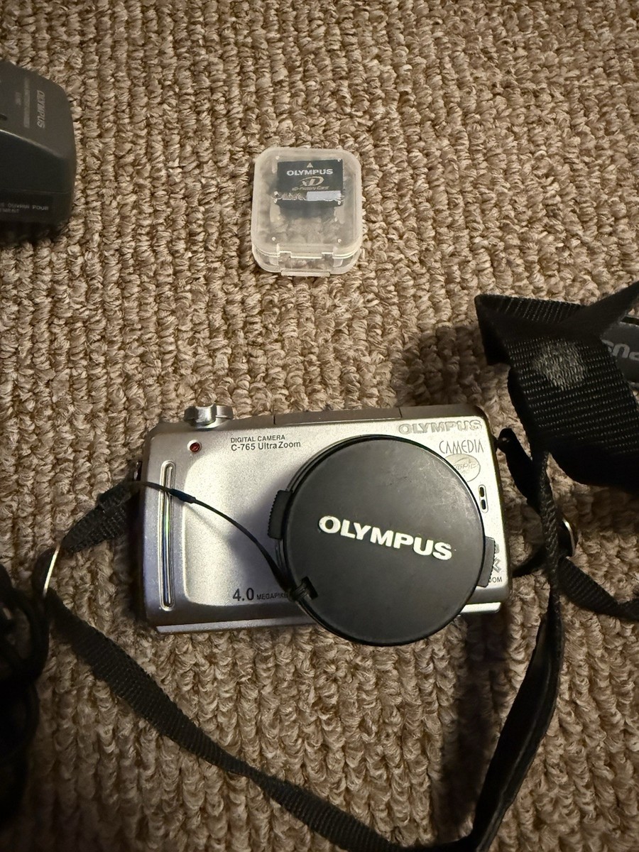 Olympus C-765 Ultra Zoom Camera, Battery, Charger, Manual, 16MB XD