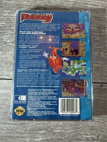 Puggsy (Sega CD, 1993) - Tested Working (Water Damage)