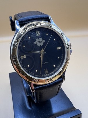 Elegant Wurth Quartz Men s Watch. Gold Tone Bezel. Black Dial. Works Great .
