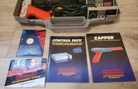 Nintendo NES Action  Set complete with Manuals and case - MINT CONDITION