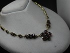 Altes vergoldetes Collier 44 cm mit Granaten in der Mitte Art Blüte