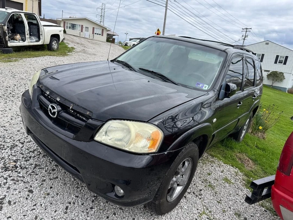 Mazda Tribute 2005 soporte radiador superior izquierdo y derecho soportes de montaje OEM usado Foto 3 de 4