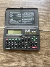Seiko SII Berlitz Spanish English Dictionary Electronic Translator TR-2720 Works