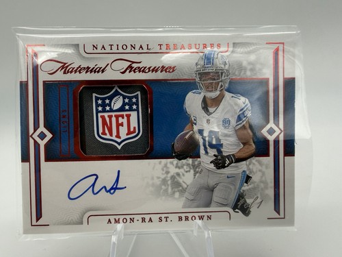2023 National Treasures Amon-Ra St. Brown Material Treasures NFL Shield Auto 1/1