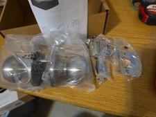 Amazon Basics Exterior Door Knob With Lock, Coastal, Satin Nickel