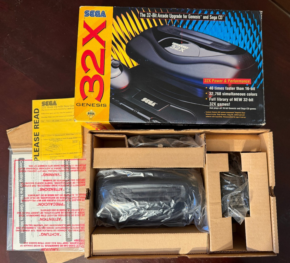 The Sega 32X is a genuinely rare piece of gaming history — a cartridge add-on that sat on top of a Genesis and flopped spectacularly, making complete boxed versions with manuals and cables a legit collector's trophy.