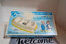 NURSERY NEEDS RAGGEDY ANN AND ANDY ELECTRIC FEEDING DISH