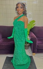 Formal sequins gown. Perfect for prom or wedding. Only worn one . Is in fair con