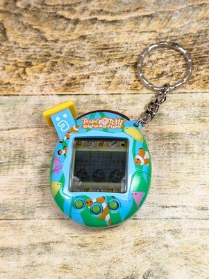 Tamagotchi Connection V5 Fish Shell Electronic Pet Clownfish 