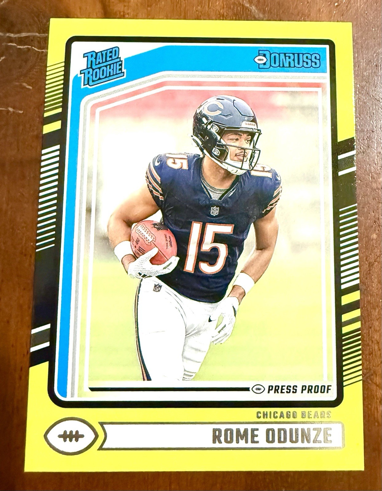 2024 Panini Donruss - Rated Rookie Rome Odunze #309 Press Proof Yellow (RC)