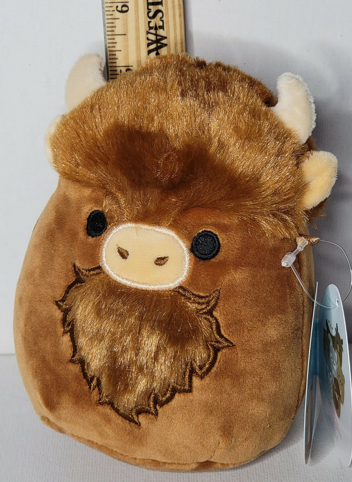 brown fluffy squishmallow