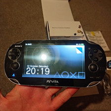 BOXED SONY PLAYSTATION.PS VITA OLED BLACK CONSOLE WITH CABLES + ALL INSERTS