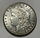 1887 S MORGAN DOLLAR AU