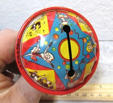 Vintage US metal toy company noise maker, colorful band, colorful graphics