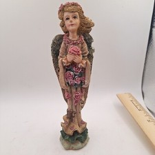 Angel 7in Tall Holding Roses