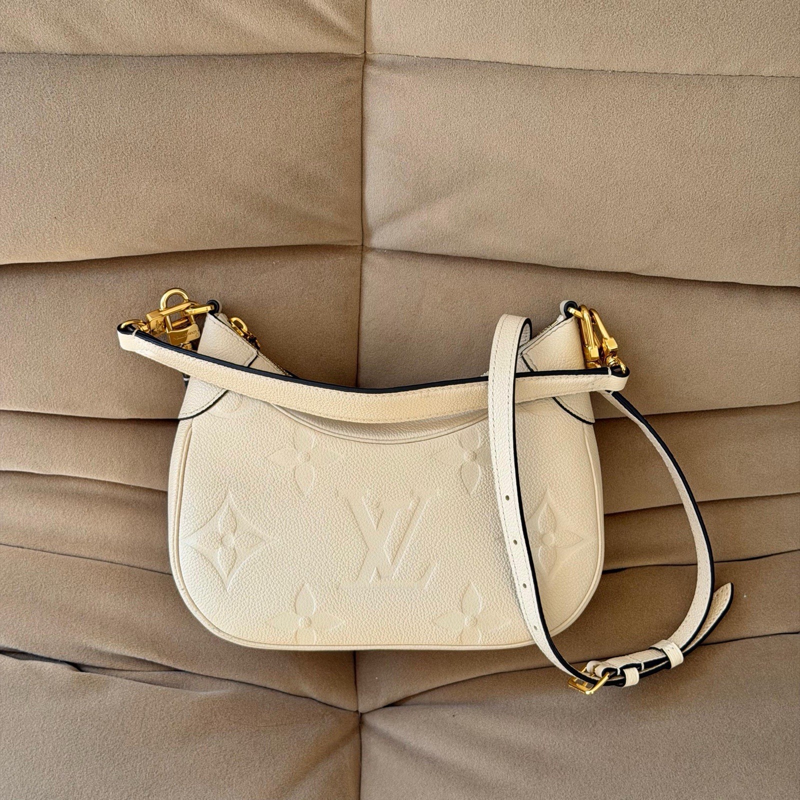 Louis Vuitton Bagatelle in Monogram Giant Empreinte Leather Creme