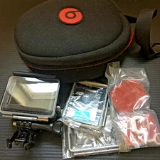 GoPro HERO+ Wi-Fi Enabled Action Camera with Accessories in a headphone Case