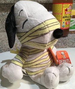 Peanuts Snoopy in Halloween Mummy Costume holding pumpkin 7