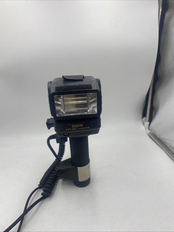 Sunpak Auto auto 555 Handle Mount Flash w/ Handle - untested