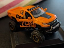 OFF ROAD FUN 1:48 SCALE 2017 CHEVY COLORADO ZR2 FRNT DOORS OPEN TANGERINE COLOR 