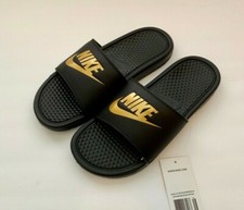nike slippers gold logo