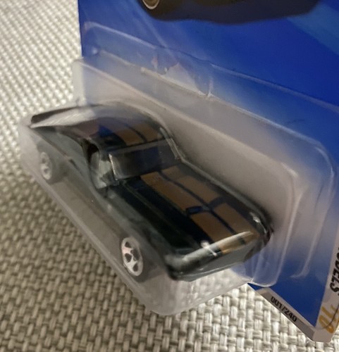 Hot Wheels 2010 nuevos modelos #01 '67 Shelby GT-500 verde oscuro con rayas doradas - Imagen 3 de 5