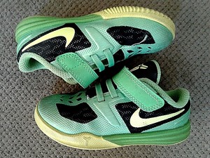green girls tennis shoes