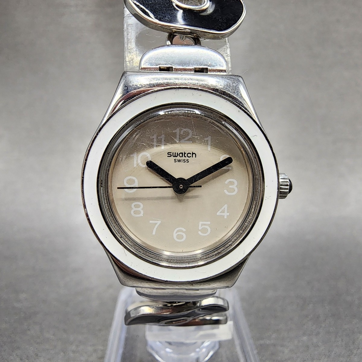 X Swatch Irony SS, case Cream colored dial Silver Arabic numerals 2 hand Amazon.com: Swatch Skin Irony Unisex Watch Casual Polymer  main image 2