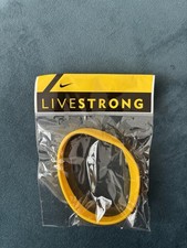 LIVESTRONG Original 2004 Yellow Wristband - New and Sealed genuine .