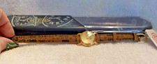 Vintage Guess watch w/ gold face  brown logo band in original box 1993