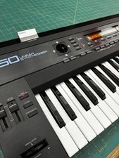 Roland D-50 Linear Synthesizer plus M-256D Memory Card