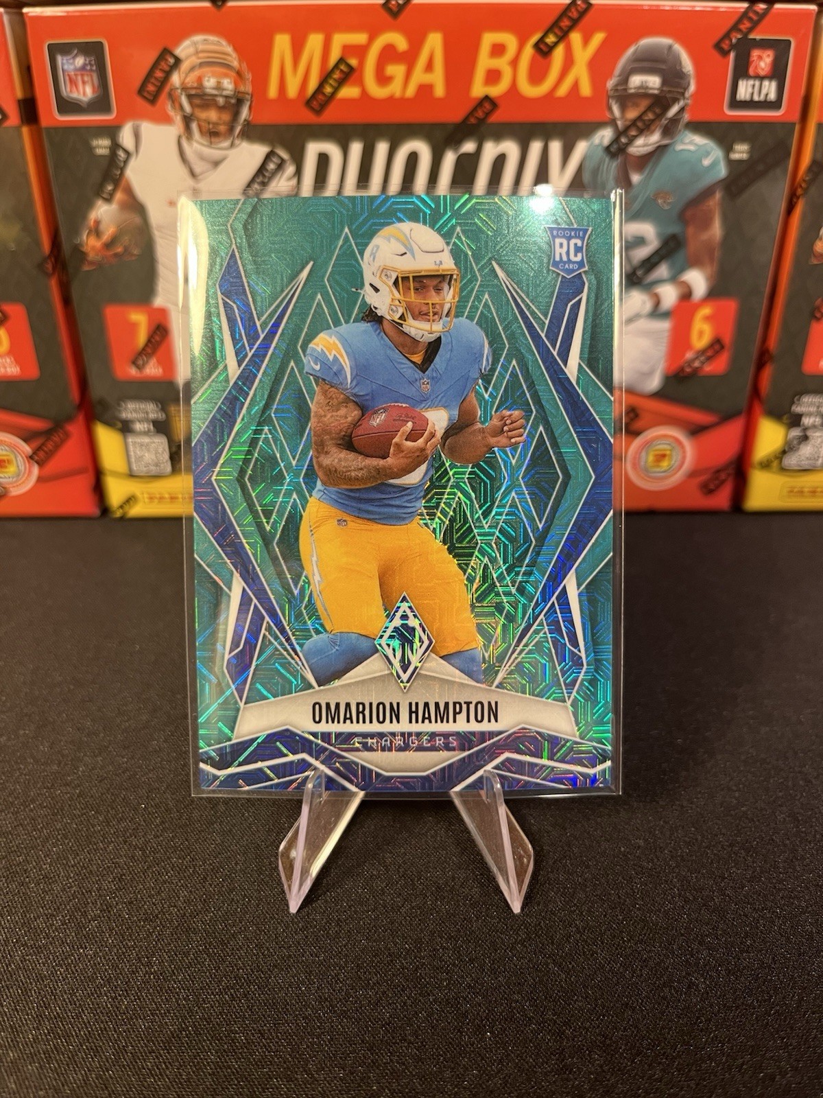 2025 Panini Phoenix - Rookies Omarion Hampton #192 Teal Mojo /50 (RC)