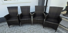 4 High quality rattan arm chairs, garden furniture, excellent condition.