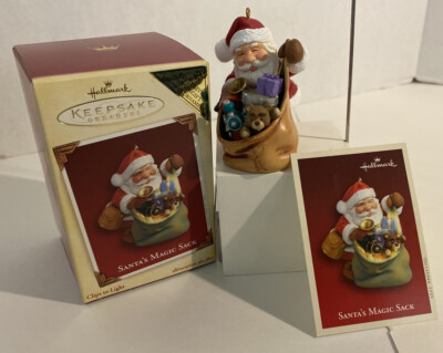 Hallmark Keepsake Christmas Ornament 2005 VIP Santa's Magic Sack Clips To Light 