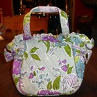 Vera Bradley small handbag with a bow on each side in Watercolor