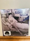 TAYLOR SWIFT - ELIZABETH TAYLOR LTD 7” - VIOLET GLITTER VINYL RSD 2026
