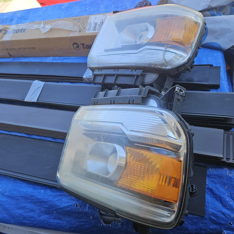 Faro derecho e izquierdo GMC Sierra 2014-15-6 OEM conjunto de luz halógena  Foto 3 de 3