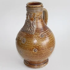 GERMANY |  Bearded man bellarmine jug, brown glaze, 8,5  inches