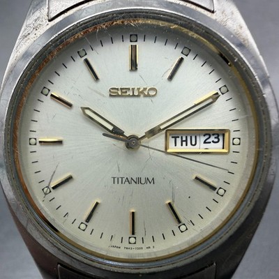 Seiko Watch Men 36mm Champagne Dial Two Tone Titanium Daydate 7N43