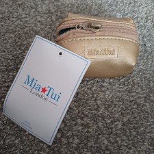 Mia Tui Ruby Earbud Case - Gold. New With Tags. H6cm W8cm D3cm