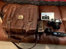 minolta xd-5 w 50 mm lens, vivitar 2x muliplier, auto winder, case and owners ma