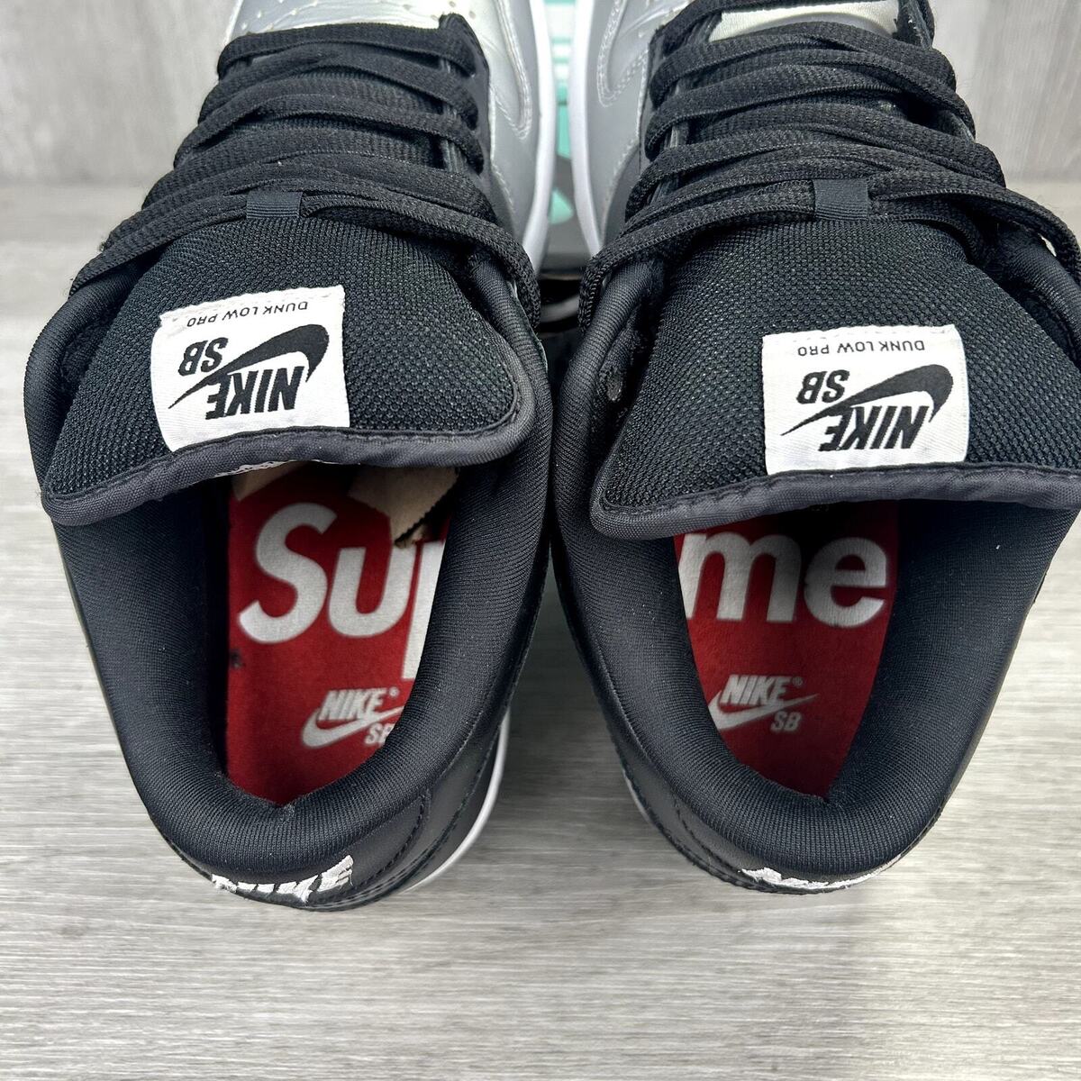 Nike SB Dunk Low Supreme Metallic Silver Black Jewel Swoosh Nike SB Dunk Low Supreme Metallic Silver Black Jewel Swoosh