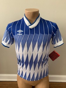 blue white striped soccer jersey