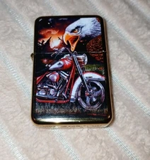 Refillable Star® Flip Top Gold Lighter With Embossed Bald Eagle/Motorcycle 