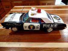 VINTAGE TIN LITHOGRAPH BATTERY OPERATED POLICE CAR, BUICK RIVIERA MADE IN JAPAN