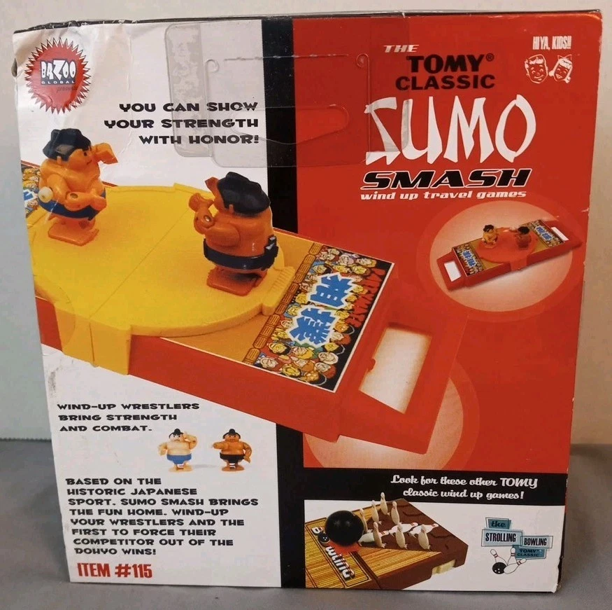 Tomy Classics Sumo Smash Wind Up Juego de Viaje 2009 Bazoo Global Nuevo con Caja Dañada Foto 2 de 4