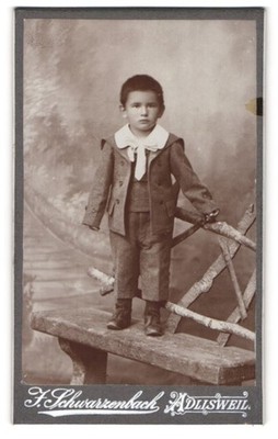 Photograph F. Schwarzenbach, Adlisweil, Little Boy in Coat on a Ban 